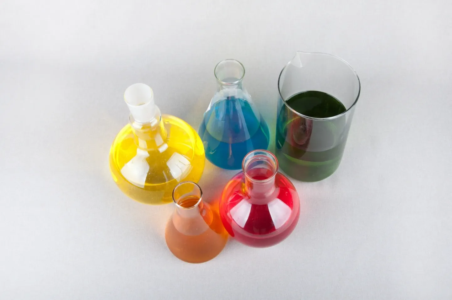 Colorful laboratory glassware on display